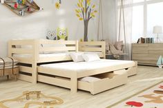 a child's bedroom with wooden furniture and decor