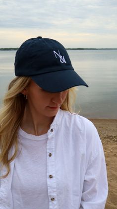 Stay cool and stylish this summer with our limited edition N & I Baseball Cap in navy. The adjustable sizing ensures a perfect fit, while the white embroidered logos on the front and back add a touch of sophistication. Upgrade your summer style with N & I. Cap Outfits For Women Summer, Baseball Cap Outfits For Women, Baseball Cap Outfits, Cap Outfits For Women, Outfits For Women Summer, Summer Baseball, Ear Cuff Earings, Anklet Jewelry, Cuff Earrings