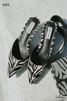 Finish off your OOTD with the ultra-stylish addition of the Steve Madden Micki-Z Zebra Calf Hair Leather Kitten Heel Mule Pumps! Sleek, genuine calf hair (with a black and white zebra print throughout) shapes these chic pumps with a classy pointed-toe upper and a low-cut collar. The effortless slide-on design sits atop a low, sculpted spool heel! 2. 25" sculpted spool heel. Cushioned insole. Rubber sole has nonskid markings. Genuine leather upper and sock. Synthetic lining. Balance man made materials. Imported. Lulus | Micki-Z Zebra Calf Hair Leather Kitten Heel Mule Pumps. Designer Kitten Heels, Mule Pumps, Zebra Print Heels, Spool Heel, White Zebra, Shoes Heels Pumps, Calf Hair, Kitten Heel, Zebra Print