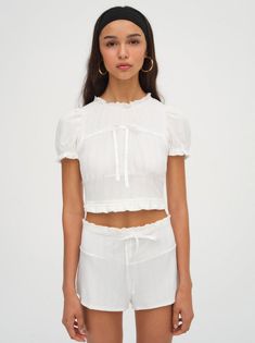 Allison Pointelle Short | For Love & Lemons Cropped Summer Bottoms For Daywear, White Tops With Elastic Waistband, Short Length, White Tops With Elastic Waistband And Short Length, Spring Ruffled Short Length Tops, Ruffled Tops For Spring, Short Length, Ruffled Short-length Tops For Spring, Ruffled Short Length Tops For Spring, Summer Ruffled Short Tops, White Top With Elastic Waistband For Spring