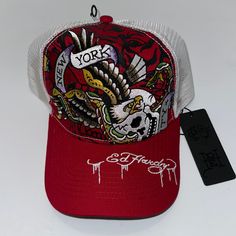 Ed Hardy Red Trucker Hat With Eagle And Skull Trendy Red Trucker Hat For Summer, Trendy Red Cap, Trendy Red Baseball Cap, Trendy Red Hat With Curved Brim, Red Baseball Cap Trucker Hat For Spring, Trendy Red Trucker Hat With Flat Brim, Red Short Brim Baseball Cap For Spring, Red Trucker Hat Baseball Cap For Spring, Red Trucker Hat For Spring