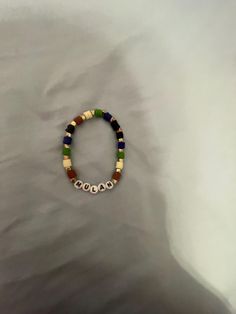 a beaded bracelet with beads on it