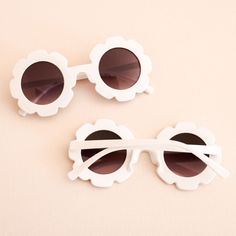 Flower Sunglasses - Child Flower sunglasses make a cute gift for the little flower girl in your bridal party. Each pair of white sunglasses has flower shaped frames and plastic lens. Material: Acrylic. UV400. Size: 5"L x 5"W x 2.25"HFits most children ages 3-14 Bachelorette Party Items, Bachelorette Sunglasses, Girl Sunglasses, Wedding Sunglasses, Flower Sunglasses, Gifts For My Girlfriend, White Sunglasses, Pillows Flowers, Girl With Sunglasses