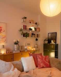 a living room filled with lots of furniture and decor