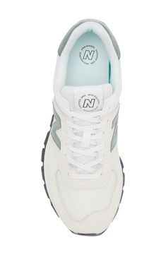 Mixed textures and sporty details wrap a sneaker updated from a retro favorite to a modern kickabout that pairs rugged looks with soft, comfortable cushioning. Removable insole ENCAP® midsole fuses EVA cushioning with a durable, supportive polyurethane shell Textile, synthetic or leather and synthetic upper/textile and synthetic lining/rubber sole Imported New Balance has received the Fair Labor Association accreditation, which signifies that the company has effective systems and procedures in p New Balance High-top Running Sneakers With Translucent Outsole, New Balance Sporty High-top Sneakers With Translucent Outsole, New Balance High-top Sneakers With Translucent Outsole, Sporty New Balance Running Shoes With Rubber Waffle Outsoles, New Balance High-top Running Sneakers With Cushioned Footbed, New Balance Sporty Sneakers With Cushioned Footbed, New Balance Functional Running Shoes With Translucent Outsole, New Balance Functional Sneakers With Cushioned Footbed, New Balance Sneakers With Cushioned Footbed For Light Sports