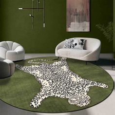 a living room with green walls and leopard print rug on the floor next to two white chairs