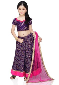 Enhanced with bandhej print, lace and tassels. Highlighted with patch border. Available with a violet art chanderi silk brocade readymade choli and fuchsia shimmer net dupatta. Lining is of cotton. Plus or minus half to one inch may differ in measurement. We sell all kinds of Kidswear. Indian Kids Wear | Kids Collection | Indian Kids Kurta | Kids Kurta Payjama | Kids Indian Dresses | Indian Kids Outfit | Kids Kurta Set | Pajama And Kurta | Traditional Kids Wear | Party Wear Kids Wear | Wedding K Indian Clothes For Kids, Crepe Lehenga, Kids Salwar Kameez, Bandhej Print, Kids Indian Wear, Kids Lehenga Choli, Kids Kurta, Kids Lehenga, Utsav Fashion