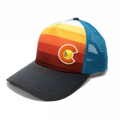 Our Sunset Fader is the newest graphic-printed hat featuring a deep red to a bright yellow gradient and a gray bill with blue contrast stitching and a green under-bill. ------------------------------------------ SHAPE --- MidProfile BRIM --- Precurved CLOSURE --- Snapback BACK --- Mesh Back FIT & SIZE --- One Size Fits Most Adults ------------------------------------------ Colorado Embroidery, Colorado Fashion, Colorado Sunset, Yellow Gradient, Colorado Outfits, Mens Trucker Hat, Flag Outfit, Outdoor Cap, Kentucky Derby Hat