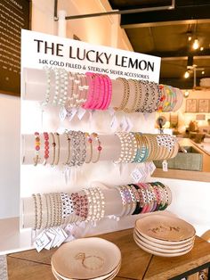 the lucky lemon jewelry display is full of bracelets