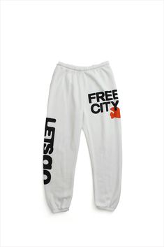 Unisex sweatpant with classic "Free City" print in black and yellow. A supersoft essential sweatpant with a covered elastic waist and a pull drawstring. WHY WE LOVE IT FREECITY, born in 2001, uses local factories with custom developed materials, fabrications, washes and dyes. Prints are hand-thrown, using hand-mixed paint with on-screen mixed gradients - made one by one, in small batches. DETAILS Medium weight polyblend: 50% rayon, 25% polyester, 25% cotton. Hand-sewn, washed, and hand-screen pr Free City Sweats, Free City Sweatpants, Cool Sweatpants, Graphic Sweatpants, Cute Sweatpants, Free City, Knit Shoes, Reference Pictures, City Print