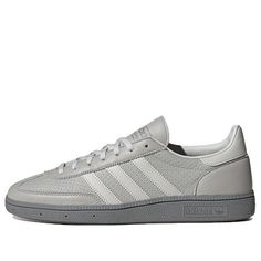 Adidas Gray Sneakers With Gum Sole, Gray Sporty Skate Shoes With Gum Sole, Gray Skate Shoes With Gum Sole For Sports, Gray Adidas Sneakers With Round Toe, Gray Adidas Sneakers With Logo, Gray Sports Sneakers With Gum Sole, Gray Rubber Sole Basketball Shoes For Sports, Gray Gum Sole Sneakers For Sports, Gray Skate Shoes With Cushioned Footbed For Sports