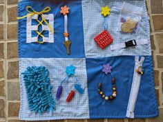 a blue and white quilt with various items on it