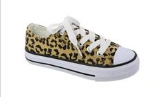 Canvas cheetah print similiar to converse sneakers. Leopard Print Lace-up Sneakers For Streetwear, Leopard Print Low-top Sneakers With Speckled Midsole, Casual Low-top Leopard Print Sneakers, Sporty Low-top Leopard Print Sneakers, Sporty Leopard Print Low-top Sneakers, Trendy Leopard Print Lace-up Sneakers, Casual Leopard Print Lace-up Sneakers, Painted Converse, Tie Sneakers