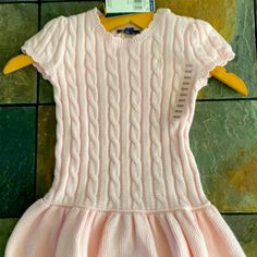 Very Nice Cable Knit With Ruffle Bottom Sweater Dress . It’s A Light Pink Color With A 2 Tone Design . Casual Pink Knitted Dress, Casual Pink Knit Dress, Cute Fitted Knit Dress, Cute Fitted Ralph Lauren Dress, Pink Short Sleeve Winter Dresses, Denim Diy Clothes, Pink Striped Shirt, Ralph Lauren Baby Girl, Girls Long Sleeve Dresses