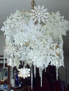 a chandelier with snowflakes hanging from it