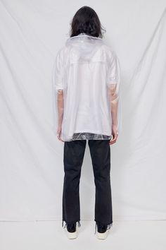 Unisex vinyl clear raincoat from Assembly New York. Covered zip closure. Front flap pockets with button closure. Relaxed fit. - 100% Vinyl - Made in USA Clear Raincoat, Vinyl Raincoat, Easy Tiger, Boutique Sales, Boutique Design, Vintage Jeans, Outerwear Women, Flap Pocket, Snap Button