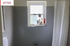 a white toilet sitting under a bathroom window next to a bathtub and shower curtain