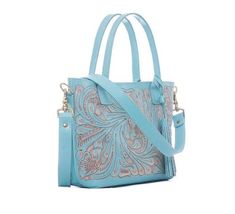 Beautiful  turquoise hand tooled leather crossbody bag.Hand Tooled, floral design on the front and back. This bag is a sister bag to our hand tooled tote, smaller in size we added a detachable long leather strap so you can wear as a crossbody bag or use as a tote. Roomy enought to carry all of your essentials while keeping you looking chic. Perfect for work, travel and everyday use. Designed for the fun loving and free spirited. *This purse is made to order and can take 4-6 weeks to ship.-Tooled Mexican Purse, Turquoise Bag, Tool Tote, Tooled Leather Bag, Purse Handmade, Leather Workshop, Leather Carving, Brown Leather Bag, Hand Tooled Leather