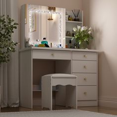 a white desk with a mirror and lights on it