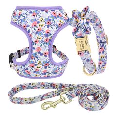 a floral dog harness and leash set with flowers on the front, purple trimming