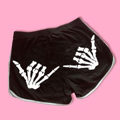 Hang Low Skeleton Hand Shorts | Cute Dolphin Shorts | Y2K Shorts | Goth Shorts | Funny Shorts | Y2K Shorts | Lounge Shorts Halloween Shorts Comfy Shorts to Lounge in! Actual item may be lighter/darker than pictured. M A T E R I A L S - 95% Cotton / 5% Spandex - Available In Sizes S-L S I Z I N G - Size chart is available on our listing photos. S H I P P I N G  &  P R O D U C T I O N  T I M E - Production Time is 5 Business Days. (May be delayed during the Holiday Season) - Shipping Time is 2-6 B Glitter Skeleton, Goth Shorts, Cute Dolphin, Silly Shirt, Shorts Comfy, Funny Shorts, Shorts Y2k, Black Lounge, Dolphin Shorts