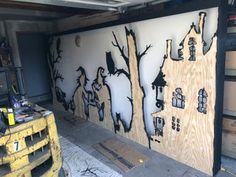 a garage door with some drawings on it