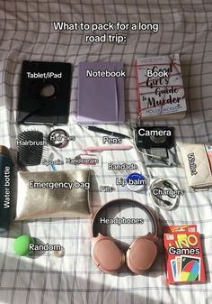 the contents of a travel bag laid out on a bed with instructions to read them