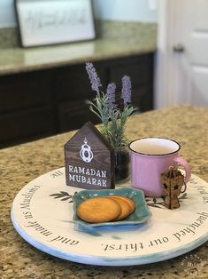 a plate with some cookies and a cup on it