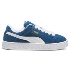 This fresh take on the classic Suede draws inspiration from Puma’s heritage within breakdancing and its influence on modern streetwear. The Suede XL retains the Suede’s iconic DNA, but gives it a twist with an exaggerated padded collar and tongue, plus a chunkier sole. This execution features a full suede upper with a leather Formstrip. $74.95 Blue Suede Sneakers For Streetwear, Classic Blue Sneakers With Perforated Toe Box, Blue Suede Low-top Skate Shoes, Classic Sneakers With Padded Tongue For Sports, Blue Suede Sneakers For Sports, Modern Blue Lace-up Skate Shoes, Classic Blue Low-top Skate Shoes, Blue Classic Synthetic Sneakers, Classic Leather Sneakers With Padded Tongue