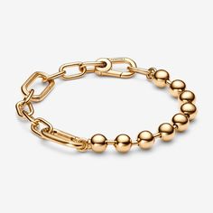 The Pandora ME Metal Bead & Link Chain Bracelet proves that opposites attract. Pairing two essential styles – metal beads and chain links – this 14k gold-plated bracelet can be customised by styling the links with mini dangle charms or medallion charms. Balancing 90s punk rock influences with the timelessness of warm gold tones, this statement bracelet can stand alone or be layered and styled in fresh ways every day. - Pandora ME Metal Bead & Link Chain Bracelet - 14k Gold-plated unique metal bl 90s Punk Rock, Pandora Me, 90s Punk, Bracelet Pandora, Metal Bead, Link Chain Bracelet, Opposites Attract, Mesh Bracelet, Chain Links