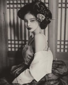 black and white photograph of a woman in a dress