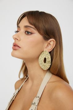 Large metal earrings Geometric disc shape Convenient push-back post Made from iron Get their attention in our chic Eldorado earrings. Featuring an oversized disc design and textured finish, they're perfect for a glam night out. Team them with an LBD and heels and watch heads turn. MATERIAL IRON Chic Textured Gold Earrings, Chic Hammered Metal Earrings, Chic Textured Metal Earrings, Hammered Hoop Earrings For Party, Modern Hammered Earrings For Parties, Modern Hammered Earrings For Party, Disc Design, Earrings Geometric, Disc Earrings