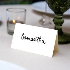 a place card sitting on top of a table