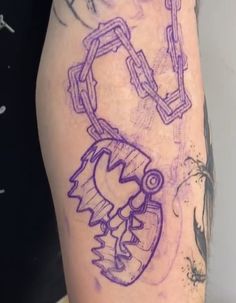 a person with a purple tattoo on their arm