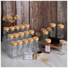 bottles and spices are arranged on a table