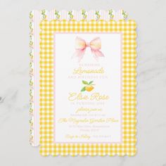 a yellow and white gingham baby shower with a bow on it's head