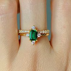 This gorgeous, timeless ring features our favorite stunning emerald design and hand picked crystals.   ✦ DETAILS ✦ ✧ Handcrafted  ✧ Natural crystals and emerald ✧ Sizes 3.75-11.25 ✧ Rose Gold over Sterling Silver 925 or Gold over Sterling Silver 925 or Sterling Silver 925  ✧ This ring will arrive ready to gift in a Kherish Jewelry Pouch. ✧ PRE-ORDER: Items that are preorder only will ship within 10-15 business days.  You will receive an email with the updated processing time if you order a size/option that qualifies for pre-order.  ✧ Due to the nature of the handmade process, each piece may slightly vary in color, size, shape, and contain natural inclusions. Every piece is gorgeous and one of a kind.  *Please refer to photos for reference.  ✦ This Artist Has Autism✦  Every item you order f Emerald Design, Vintage Emerald Ring, Dainty Engagement, Emerald Ring Vintage, Timeless Ring, Rings Women, Emerald Engagement Ring Cut, Gold Filled Ring, Emerald Jewelry