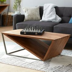 a coffee table with chess pieces on it