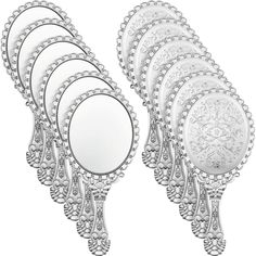 six mirrors with intricate designs and beading on the edges, all lined up in rows