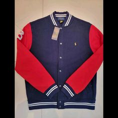 Polo Ralph Lauren Vintage 1990s Blue And Red Jacket Ralph Lauren Casual Fall Outerwear, Casual Ralph Lauren Fall Outerwear, Casual Blue Varsity Jacket, Red Casual Outerwear For School, Casual Blue Varsity Jacket For Winter, Casual Red Outerwear With Ribbed Collar, Casual Ralph Lauren Outerwear, Casual Blue Varsity Jacket With Pockets, Sporty Navy Outerwear For School