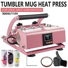 a pink heater machine with two cups next to it and the words tumbler mug