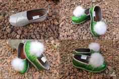 four pairs of green and white shoes with pom - poms on the toes