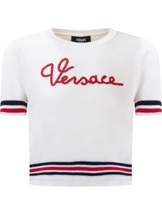 White short-sleeved T-shirt. Crew neck. Ribbed collar and hem. Striped trim that features an embroidered nautical-themed Versace logo on the front.Composition: Outside: 100% Cottonricamo: 35% Wool, 35% Acrylic, 30% Polyester Logo Detail Short Sleeve Tops For Summer, Short Sleeve Tops With Logo Detail For Summer, White Logo Detail Short Sleeve Tops, White Short Sleeve Tops With Logo Detail, White Short Sleeve Top With Logo Detail, Sporty Short Sleeve Top With Appliqué Logo, Versace Shirts, Nautical Shirt, Versace Logo