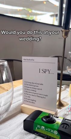 a table with a sign that says, would you do this at your wedding?