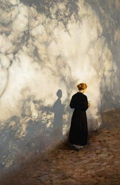 a painting of a woman standing in front of a wall that has clouds on it