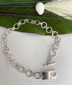 Trendy Silver Oval Link Jewelry, Silver Adjustable Chain Necklace For Fashion, Chic Silver Link Jewelry, Modern Chunky Silver Jewelry, Silver Toggle Choker Necklace With Lobster Clasp, Elegant Silver Link Choker, Chic Silver Choker With Adjustable Chain, Silver Chunky Metal Chain Necklace, Silver Chic Choker With Adjustable Chain