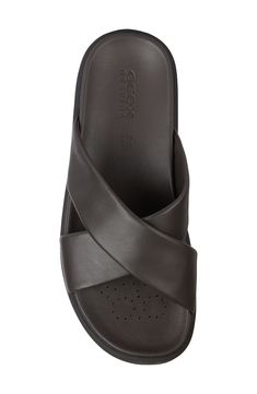 A cushy footbed and breathable, waterproof sole will keep feet comfortable in this everyday sandal designed with wide crossover leather straps. Cushioned footbed Patented tech sole with a durable, waterproof membrane and breathable perforations keeps feet dry and ventilated Water-resistant Leather upper and lining/rubber sole Imported Modern Brown Sandals With Ortholite Insole, Leather Slides With Ortholite Insole For Outdoor, Leather Crossover Sandals With Leather Footbed, Leather Sport Sandals With Arch Support, Leather Crossover Sandals With Removable Insole, Leather Sandals With Removable Insole And Crossover Shape, Comfortable Leather Footbed Sandals With Ortholite Insole, Casual Leather Footbed Sandals With Ortholite Insole, Leather Slide Sport Sandals With Leather Footbed