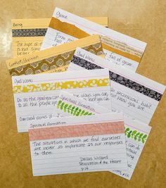 five pieces of paper with writing on them