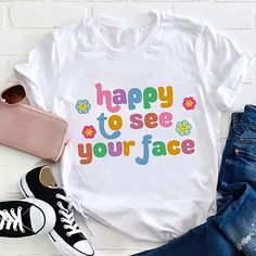 ✔️ TITTLE : Happy To See Your Face Teacher T-Shirt, Teacher Life Shirt, Kindergarten Shirt, Teacher Shirt, Gift For Teacher ✔️ IMPORTANT: Both Men and Women can we our shirts because this is unisex style t-shirts; Wash item inside out in cold water, do not bleach, do not dry clean, do not iron directly on the design. ✔️ MATERIAL DETAILS: 5.3-ounce, 100% cotton (99/1 cotton/poly (Ash) & 90/10 cotton/poly (Sport Grey); Heavyweight classic unisex tee; Taped neck and shoulders; Tearaway label ;Decor Playful Slogan T-shirt With Crew Neck, Playful Slogan Crew Neck T-shirt, White Summer T-shirt With Quote Print, Cute White T-shirt With Letter Print, Cute Slogan T-shirt With Crew Neck, Casual Multicolor T-shirt With Funny Text, White Short Sleeve T-shirt With Quote Print, Fun White T-shirt With Text Print, Fun White Print Text T-shirt