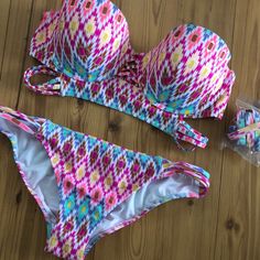 Nwot Victoria’s Secret The Midi Beach Bandeau Bikini. Push-Up Padding, Underwire, Side Boning For Support, Back Hook Closure, And Removable Halter Straps. The Bottoms Are The Strappy Cheeky With Side Straps In A Size Medium. Color:Ikat 8pc Size: 36c Sister Size Down: 34d Sister Size Up: 38b Pink Underwire Tankini For Summer, Multicolor Strapless Swimwear For Poolside, Multicolor Strapless Swimwear For Beach Season, Multicolor Bandeau Swimwear For Beach Season, Multicolor Strapless Summer Swimwear, Multicolor Bandeau Swimwear For Beach, Pink Underwire Tankini For Pool, Strapless Tankini For Beach Season Vacation, Beachwear Multicolor Bandeau Swimwear